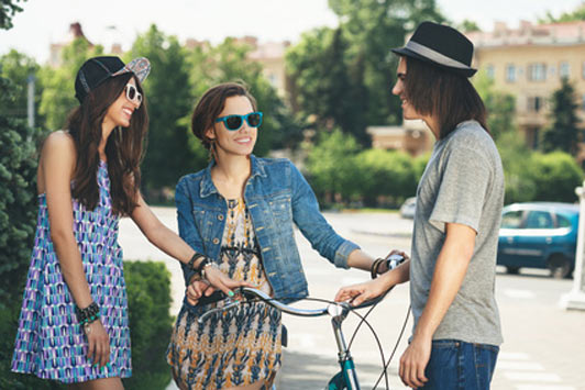 girls talking to a guy outside