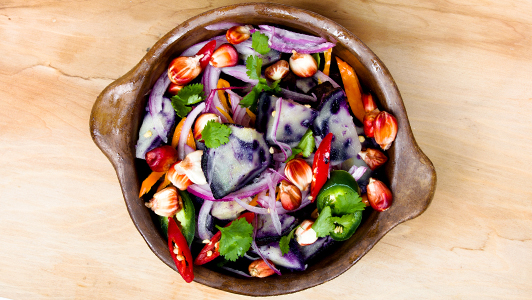 A bowl of colorful salad.