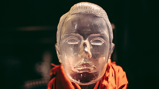 Guy's head made of glass