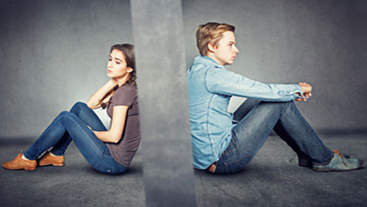 couple divided by a wall