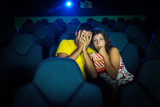 couple watching scary movie
