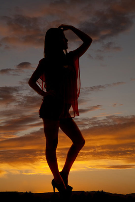 girl standing on horizon