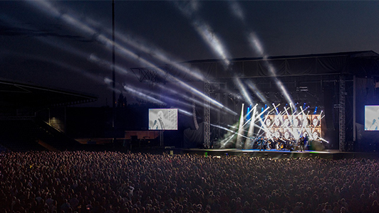 Stage and a huge crowd in the open