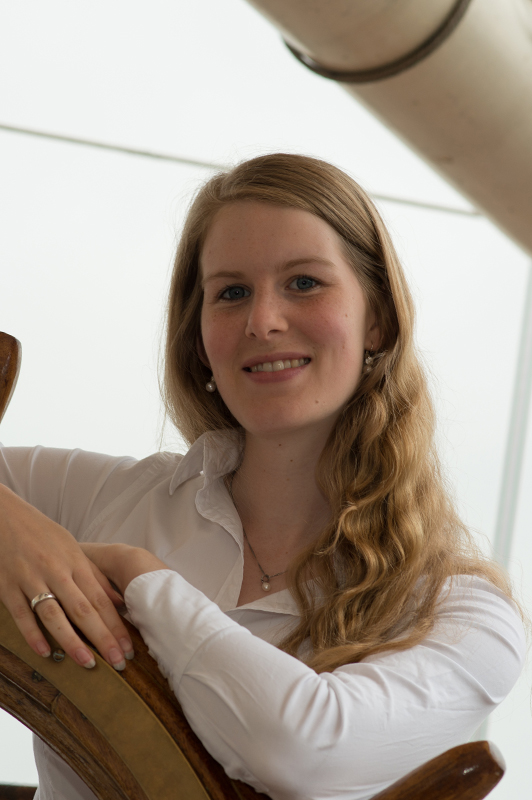 Young woman with long blonde hair.