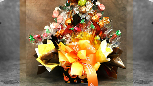 Basket with candy and a big orange bow