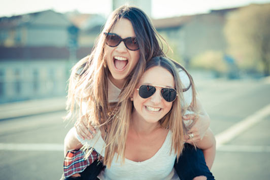 two beautiful young women having fun