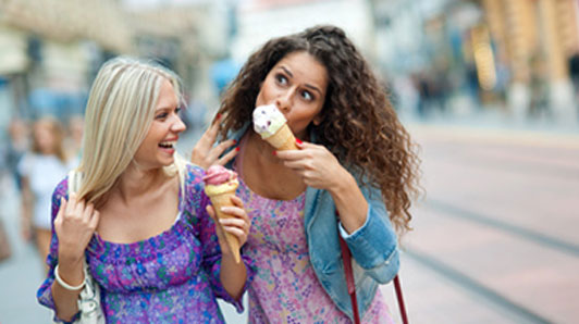 two girls eating ice cream