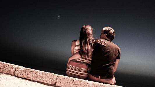 guy and girl sitting together