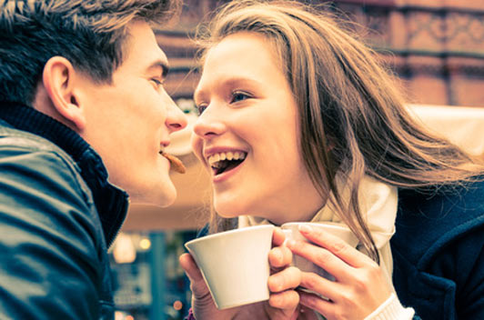 guy and girl enjoying coffee