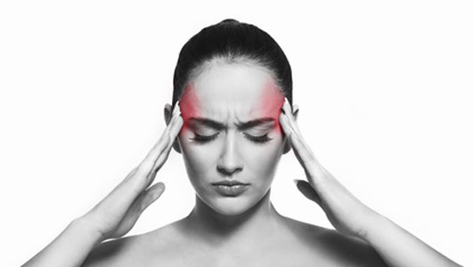 woman feeling headache