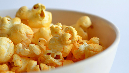 Popcorns in a white bowl