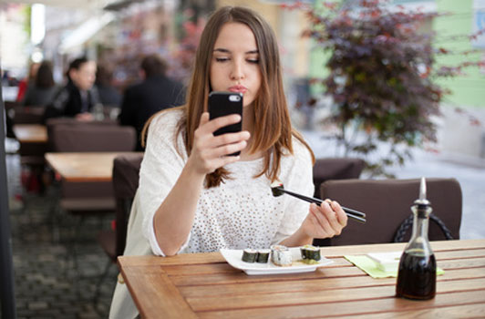 girl eating sushi