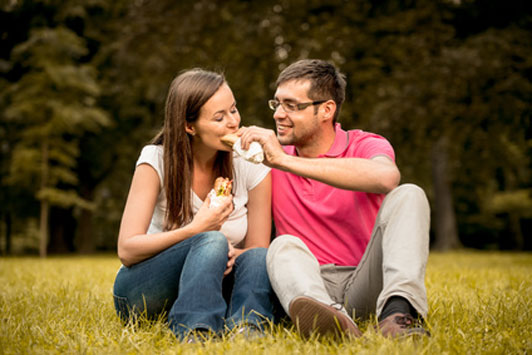 guy feeding girl