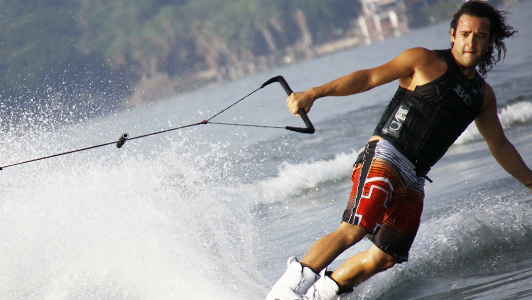 Guy water-skiing.