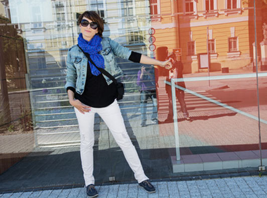 young woman wearing denim jacket